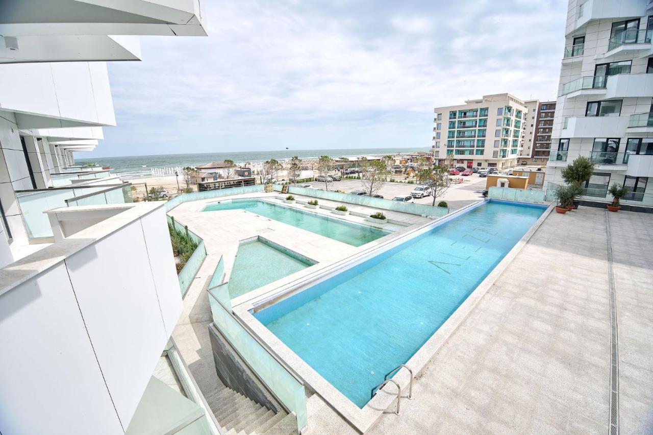 The Point In Infinity Spa&pools - Parking Mamaia